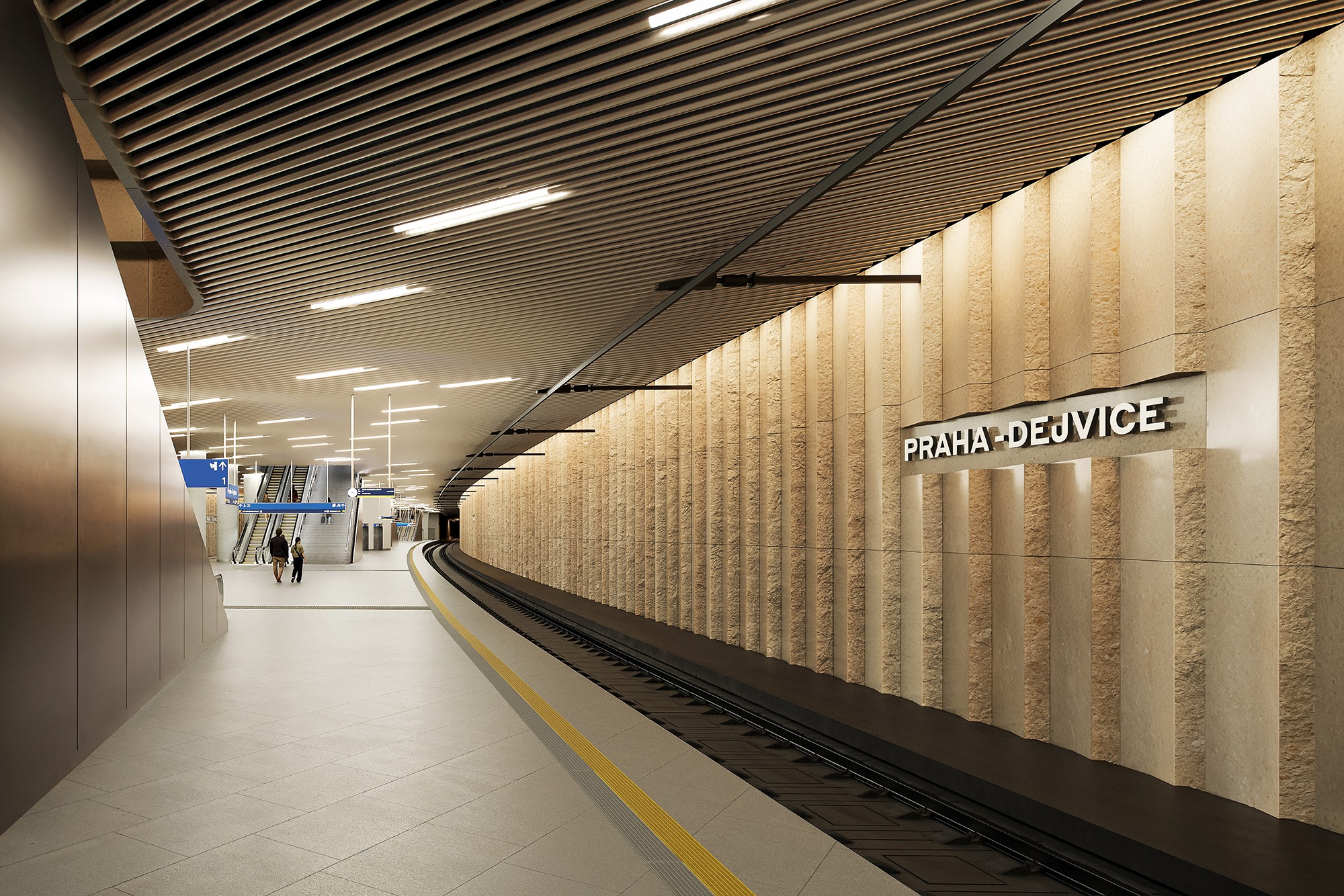 Vizualizace podzemní stanice Praha Dejvice moderní železniční uzel